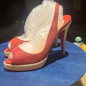 Christian Louboutin heels Sz 38.(#1387)red suede w/ 4.75" heel and 1" platform.